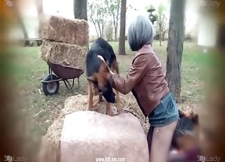 An excellent woman is deepthroating a dog cock