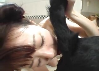 A sensual white animal and a sexy Japanese model love each other