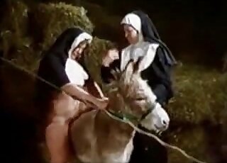 Kinky nun eaten out by a pony