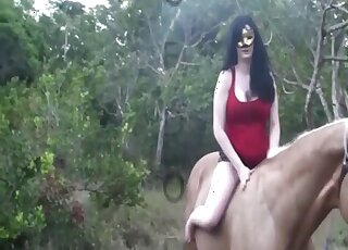 Pasty-looking brunette worships horse dick
