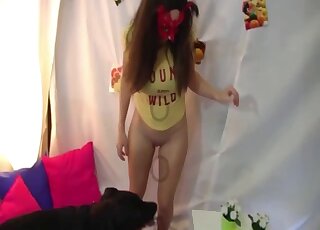 Playful zoophile with a round booty fucks a doggo