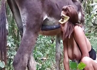Masked lady worships cock and enjoys an orgasm