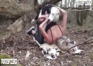 Blonde gets fucked by a dog with pants pulled down