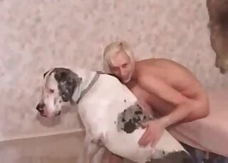 Blond-haired chick really wants that dog cock