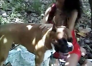 Exotic hottie in red wants to fuck a dog