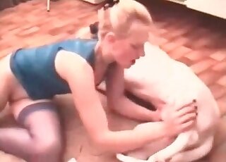 Blonde is sucking her doggy with love