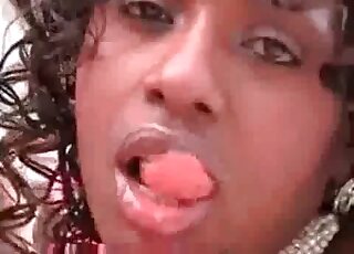 Black chick is happy to swallow a canine's cum
