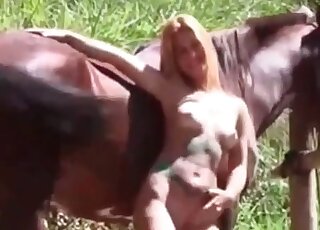 Blonde eagerly seducing a hung horse