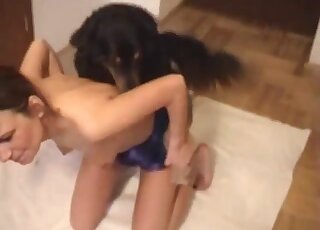 Asian angel is getting fucked by a big doggy