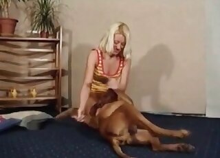 Tanned blonde seducing a hung dog