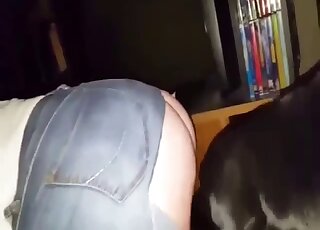 Black dog fucked her tight twat on the camera